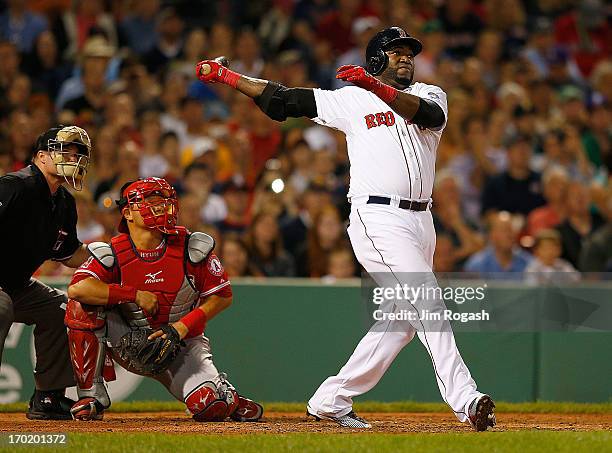 David Ortiz of the Boston Red Sox hits a two-run homes run against the Los Angeles Angels of Anaheim in the 6th inning during the second game of a...