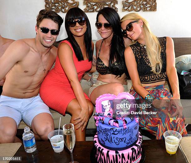 Nate Maaske, Cheryl Burke, Allison Melnick and Paris Hilton attend Melnick's birthday celebration at Daylight Beach Club at the Mandalay Bay Resort &...