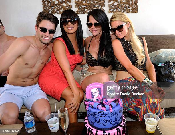 Nate Maaske, Cheryl Burke, Allison Melnick and Paris Hilton attend Melnick's birthday celebration at Daylight Beach Club at the Mandalay Bay Resort &...