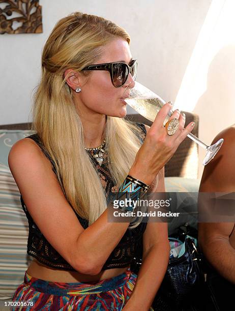Paris Hilton attends Allison Melnick's birthday celebration at Daylight Beach Club at the Mandalay Bay Resort & Casino on June 8, 2013 in Las Vegas,...