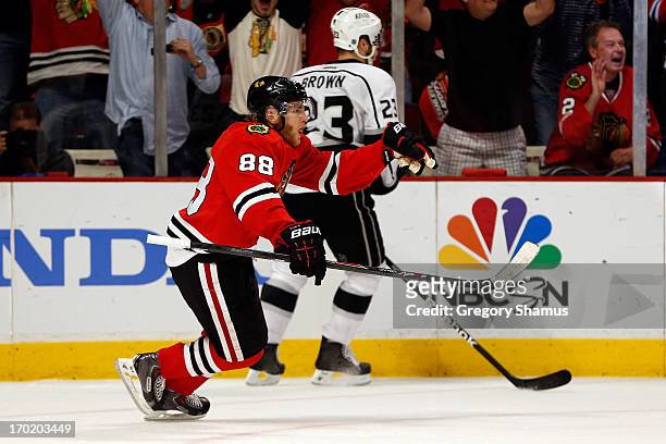 Patrick Kane of the Chicago Blackhawks celebrates after he scored a goal in the third period against the Los Angeles Kings during Game Five of the...