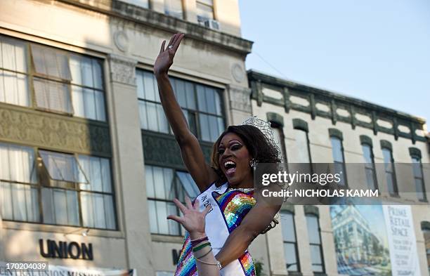 Drag queen waves aboard a float during the 2013 Capital Pride parade in Washington on June 8, 2013. This year is the 38th such annual gay pride...