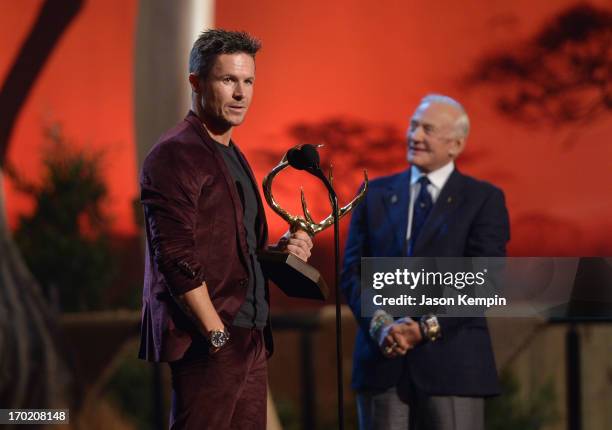 Astronaut Buzz Aldrin presents an award to skydiver Felix Baumgartner onstage during Spike TV's Guys Choice 2013 at Sony Pictures Studios on June 8,...