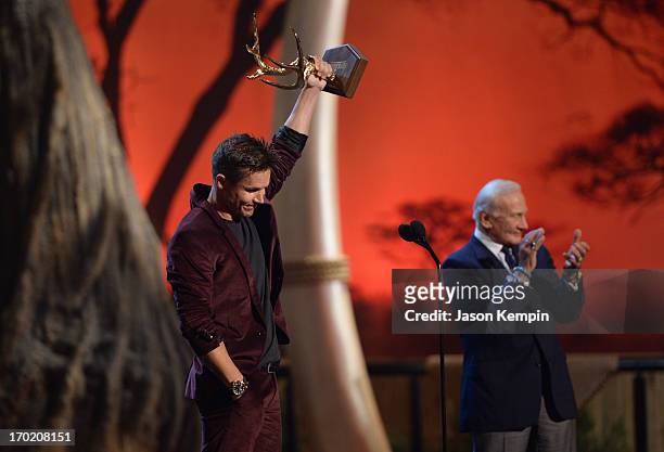 Astronaut Buzz Aldrin presents an award to skydiver Felix Baumgartner onstage during Spike TV's Guys Choice 2013 at Sony Pictures Studios on June 8,...