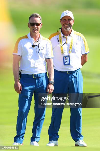 Luke Donald, Captain of Team Europe and Jose Maria Olazabal, Vice Captain of Team Europe look on from the seventh hole during the European Team...