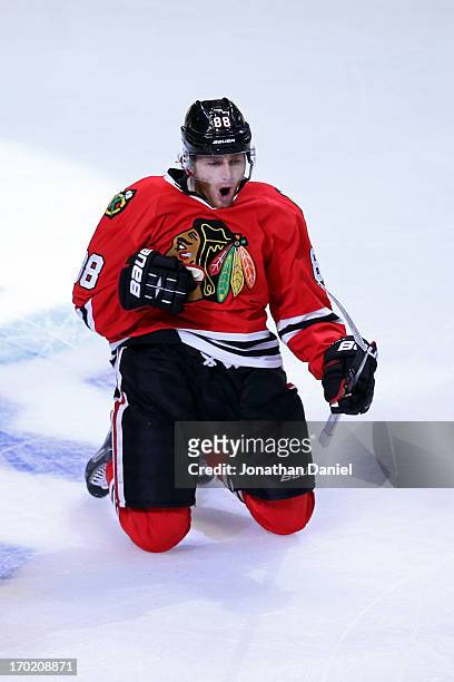 Patrick Kane of the Chicago Blackhawks celebrates after he scored the game-winning goal in the second overtime period against the Los Angeles Kings...