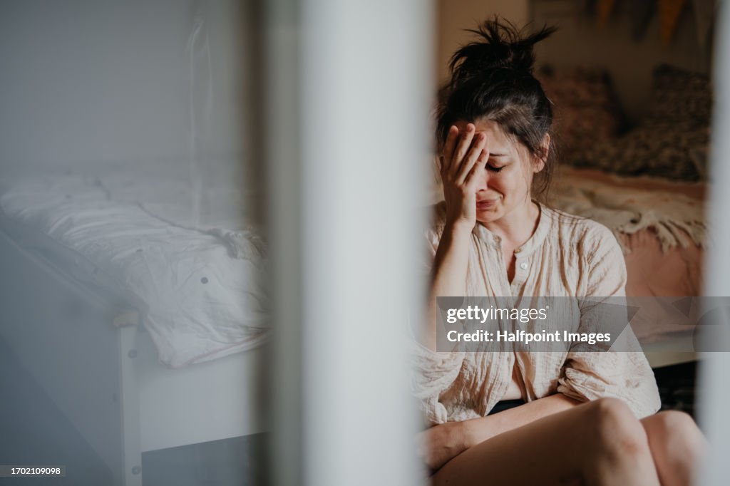 Portrait of a sad crying woman. Mental health, depression, and sorrow experienced by women.