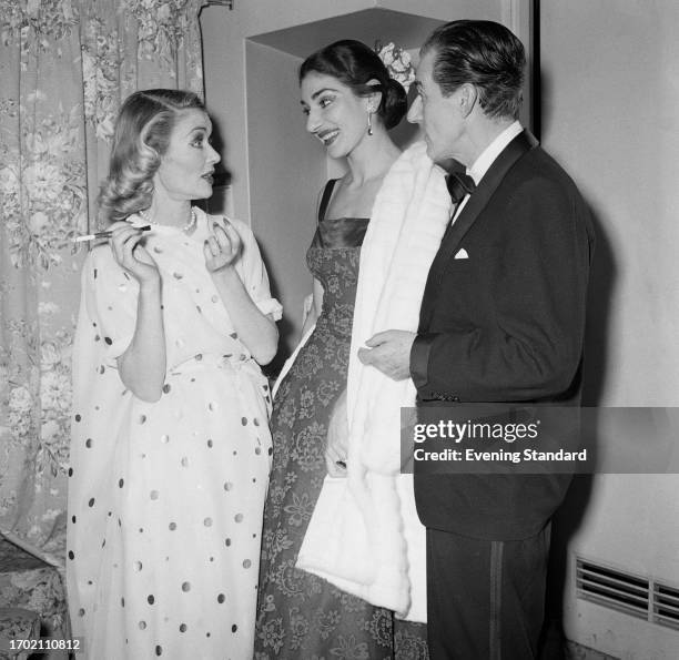 American actress Constance Bennett left, with opera singer Maria Callas and choreographer Anton Dolin February 12th 1957.