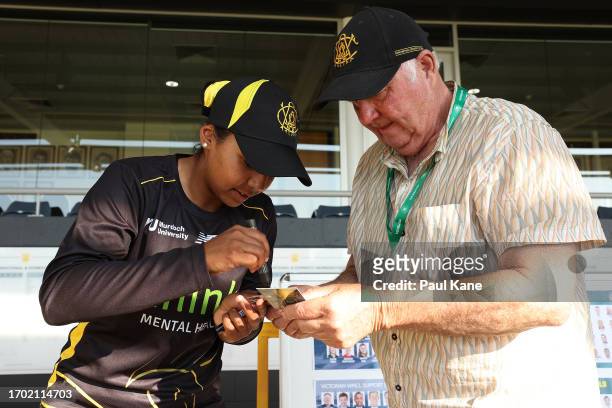 Alana King of Western Australia signs autographs following the WNCL match between Western Australia and Victoria at the WACA, on September 26 in...