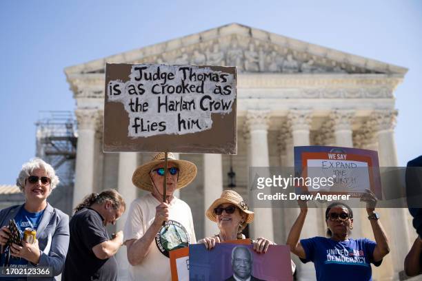 Demonstrators rally against the Conservative majority of the U.S. Supreme Court, outside the Court on October 2, 2023 in Washington, DC. The protest...
