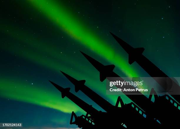 missile system on the background of the northern lights - intercontinental ballistic missile stock pictures, royalty-free photos & images