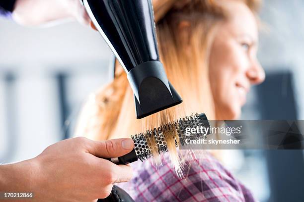 at the hairdresser's! - blow drying hair stock pictures, royalty-free photos & images