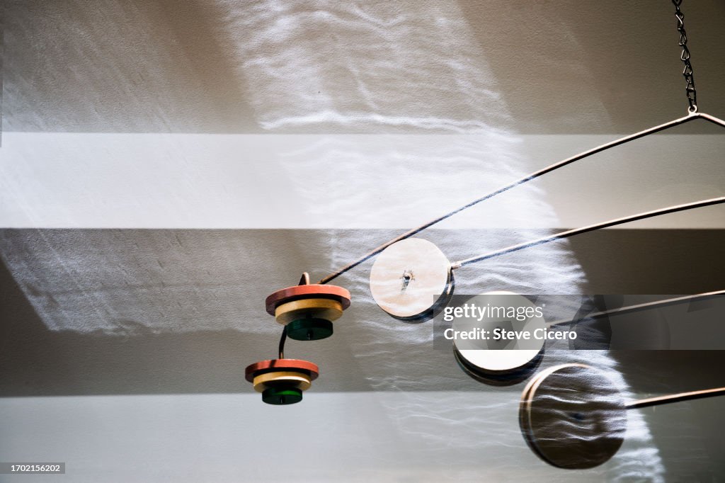 Mobile sculpture manging from ceiling