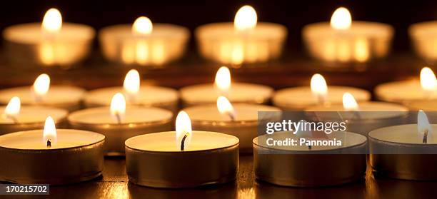 tea lights - candles - tealight stock pictures, royalty-free photos & images