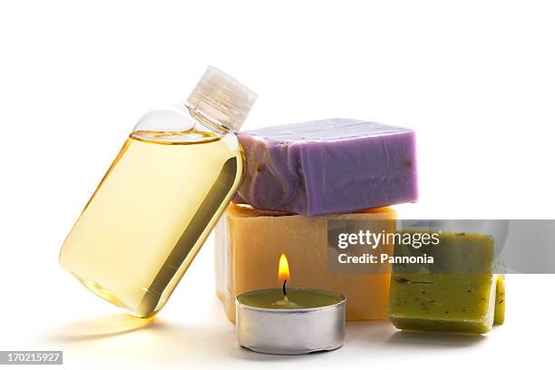 spa concept with soap, candle and massage oil - candle sets stock pictures, royalty-free photos & images