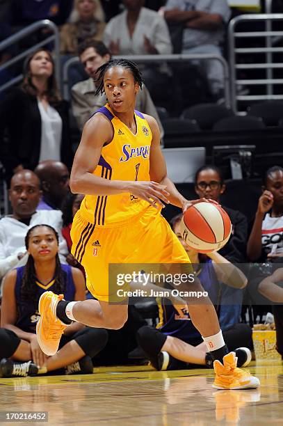 Dia Mathies of the Los Angeles Sparks drives up court during the game between the Los Angeles Sparks and the Tulsa Shock at Staples Center on June 8,...