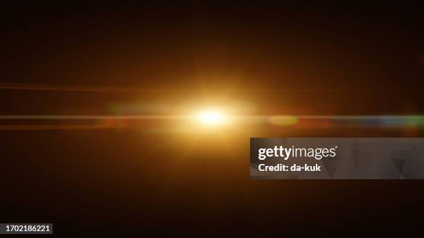 red lens flare overlay on black background design element - flitser stockfoto's en -beelden