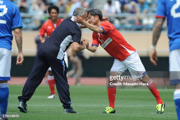 Roberto Baggio and Kazuyoshi Miura look on prior to the J.League Legend and Glorie Azzurre match at the National Stadium on June 9, 2013 in Tokyo,...