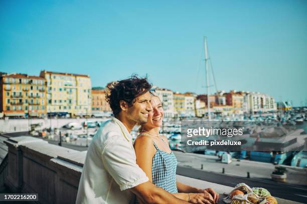 happy millennials discovering the charm of southern france, enjoying the coastal city of nice. - cote dazur stock pictures, royalty-free photos & images