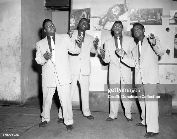 Bobby Lester, Harvey Fuqua, Prentiss Barnes and Pete Graves of the doo wop group "The Moonglows" pose for a portrait backstage at the Apollo Theatre...