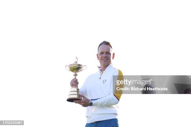 Luke Donald, Captain of Team Europe holds the Ryder Cup Trophy during the European Team Portraits at the 2023 Ryder Cup at Marco Simone Golf Club on...