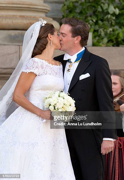 Princess Madeleine of Sweden and Christopher O'Neill greet the public and kiss after their wedding ceremony hosted by King Carl Gustaf XIV and Queen...