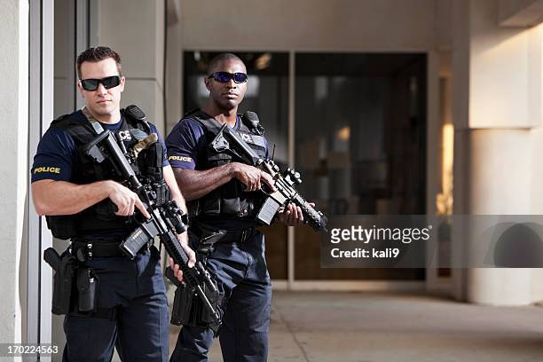 police officers with rifles - guarding stock pictures, royalty-free photos & images