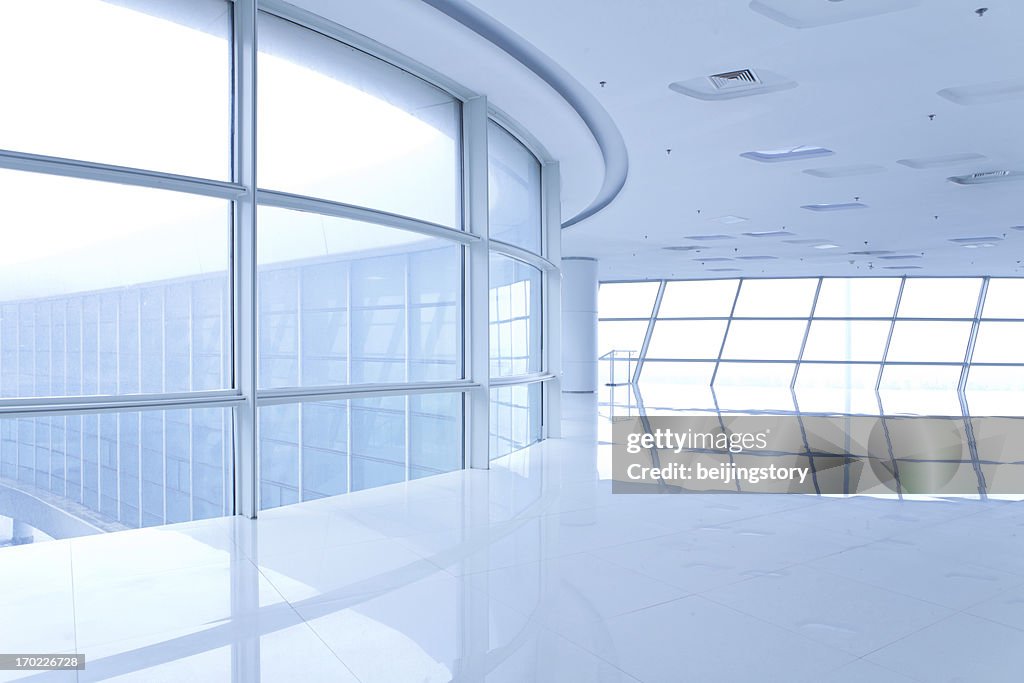 Futuristic, bright, empty white hallway