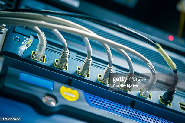 network hub and cable - internet router stock pictures, royalty-free photos & images