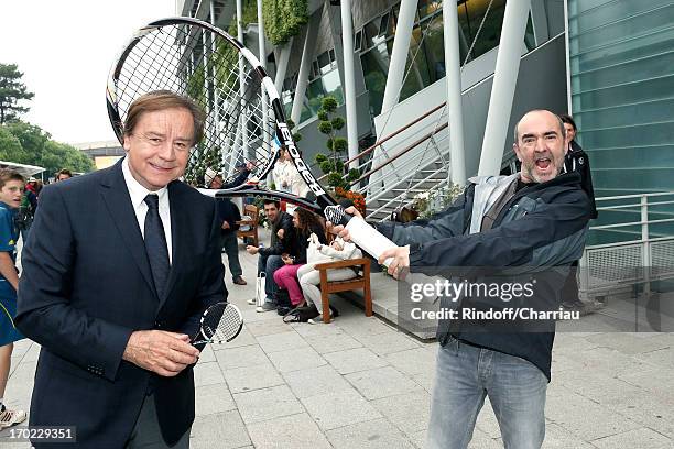 Journalist Daniel Lauclair and actor Bruno Solo sighting at the Roland Garros Tennis French Open 2013 - Day 15 on June 9, 2013 in Paris, France.