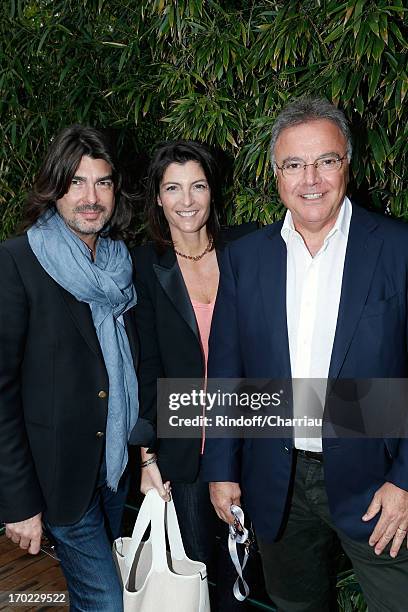 Designer Stephane Rolland , Alain Afflelou with his wife Christine sighting at the Roland Garros Tennis French Open 2013 - Day 15 on June 9, 2013 in...