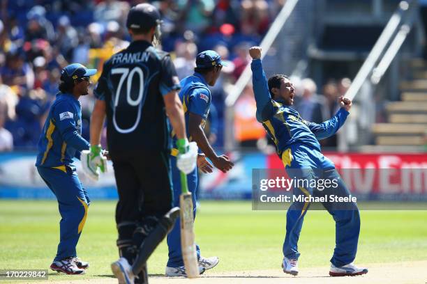 Dilshan Tilakarathne of Sri Lanka celebrates capturing the wicket of James Franklin of New Zealand fields during the Group A ICC Champions Trophy...