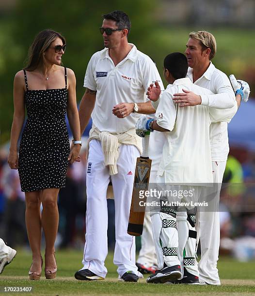 Kevin Pietersen, Elizabeth Hurley and Shane Warne pictured with Iqbal Singh during the Shane Warne's Australia vs Michael Vaughan's England T20 match...