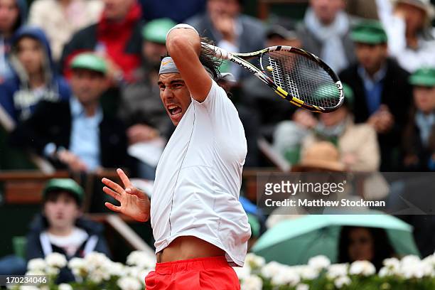 Rafael Nadal of Spain plays a forehand during the Men's Singles final match against David Ferrer of Spain on day fifteen of the French Open at Roland...