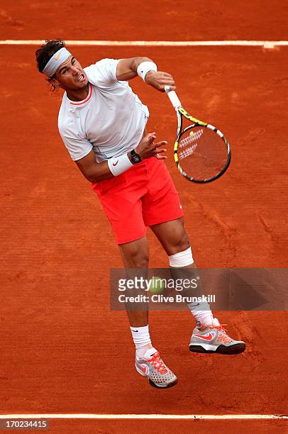 Rafael Nadal of Spain serves during the Men's Singles final match against David Ferrer of Spain on day fifteen of the French Open at Roland Garros on...