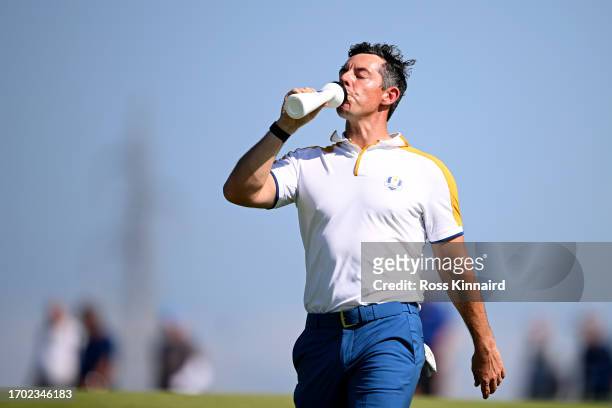 Rory McIlroy of Team Europe takes a drink on the 18th hole during a practice round prior to the 2023 Ryder Cup at Marco Simone Golf Club on September...