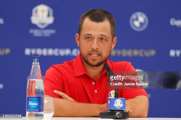 Xander Schauffele of Team United States talks in a press conference during a practice round prior to the 2023 Ryder Cup at Marco Simone Golf Club on...
