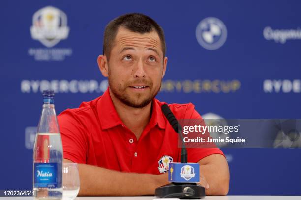 Xander Schauffele of Team United States talks in a press conference during a practice round prior to the 2023 Ryder Cup at Marco Simone Golf Club on...