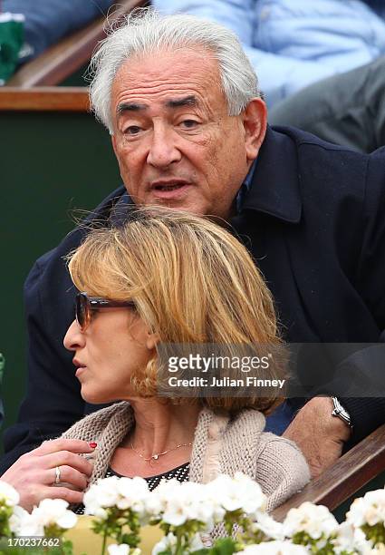 Dominique Strauss-Kahn watches the Men's Singles final match between Rafael Nadal of Spain and David Ferrer of Spain during day fifteen of the French...