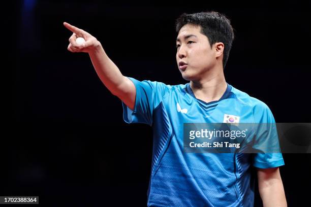 Lim Jonghoon of Korea reacts in the Table Tennis Men's Team Final match against Wang Chuqin of China during day three of the 19th Asian Games at...