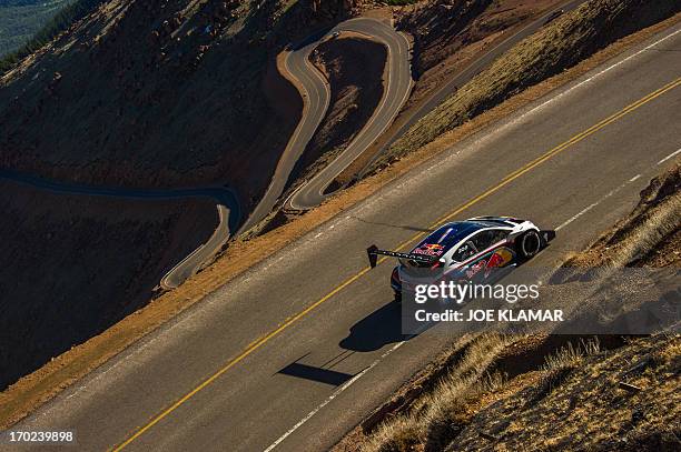 Nine-time WRC world champion Sebastien Loeb tries out his Peugeot 208 T16 to the top of Pikes Peak mountain as he prepares for the June 30 Pikes Peak...