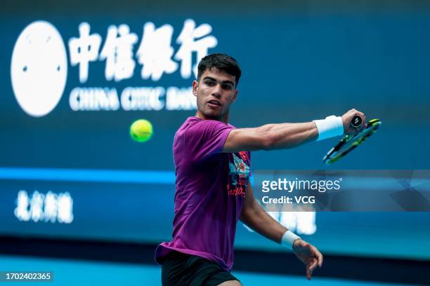 Carlos Alcaraz of Spain attends a training session on day one of 2023 China Open at the National Tennis Center on September 26, 2023 in Beijing,...