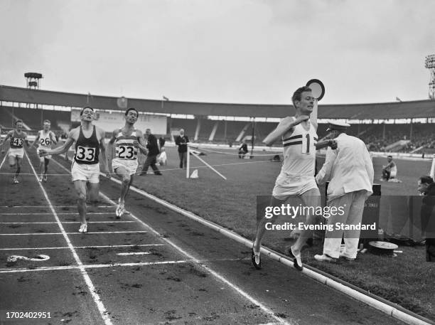 British middle-distance runner Brian Hewson winning the 880 yard race during the Amateur Athletic Association Championships at White City Stadium in...