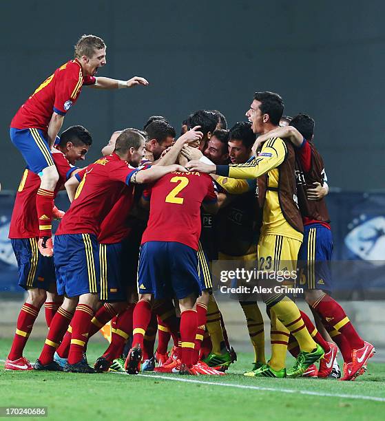 Alvaro Morata of Spain celebrates his team's winning goal with team mates during the UEFA European U21 Champiosnship Group B match between Germany...