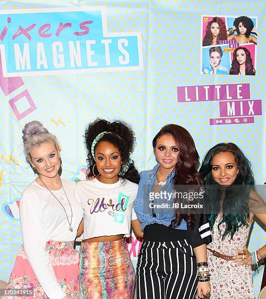 Perrie Edwards, Leigh-Anne Pinnock, Jesy Nelson and Jade Thirlwall of UK Pop sensation Little Mix sign copies of their Debut Album DNA at Barnes &...