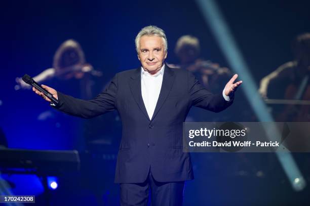 Michel Sardou performs at L'Olympia on June 9, 2013 in Paris, France.