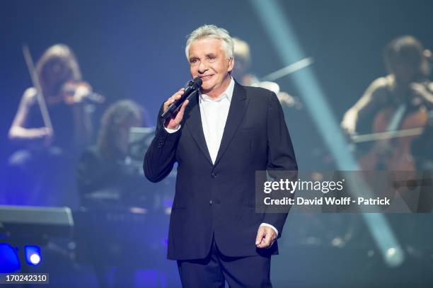 Michel Sardou performs at L'Olympia on June 9, 2013 in Paris, France.