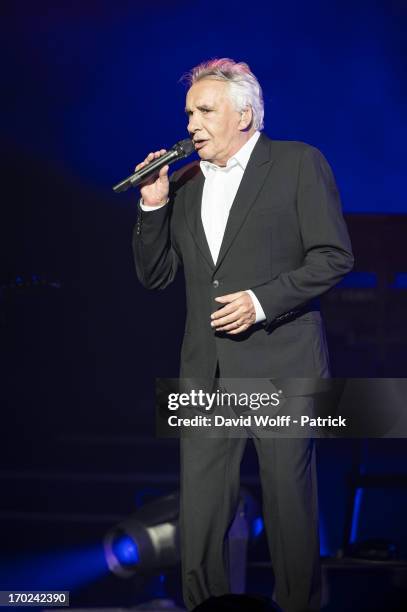 Michel Sardou performs at L'Olympia on June 9, 2013 in Paris, France.