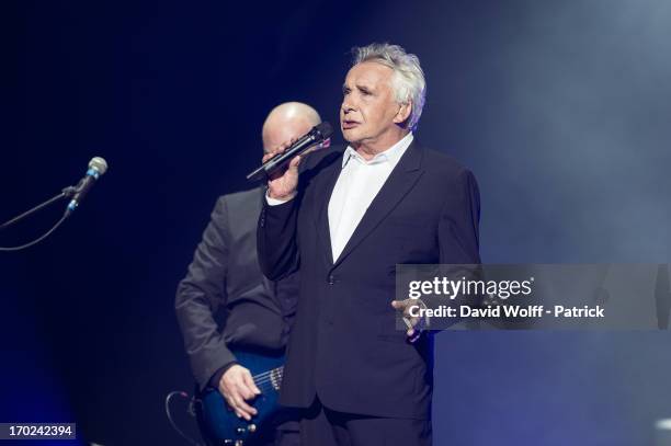 Michel Sardou performs at L'Olympia on June 9, 2013 in Paris, France.