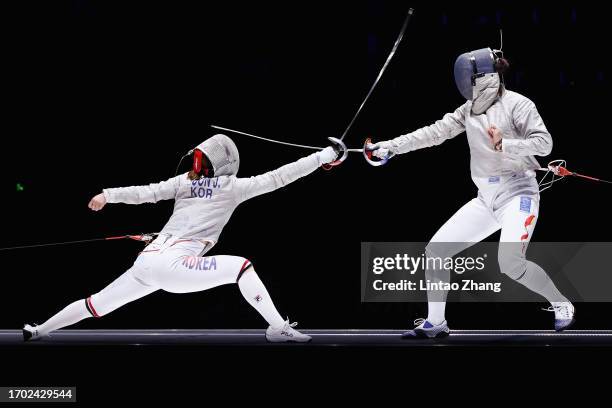 Yoon Ji-su of South Korea competing in the Women's Sabre Individual final march against Shao Yaqi of China during the 19th Asian Games at Hangzhou...